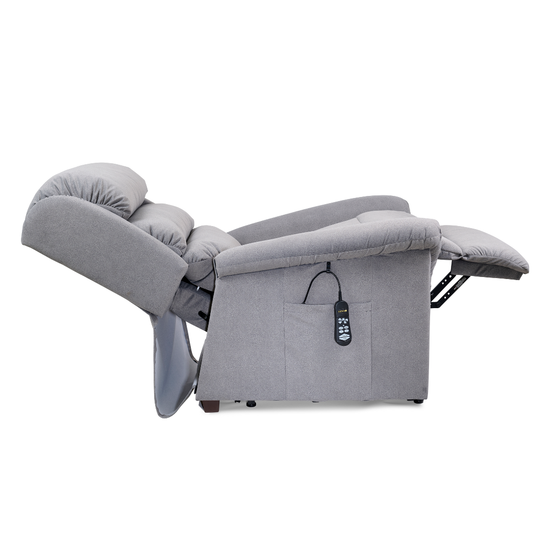 The Golden Tech PR766 Relaxer MaxiComfort Recliner With Lift Assist - Small is a gray reclining armchair with plush cushioning, featuring a side pocket with Programmable AutoDrive Hand Control. Its extended footrest and MaxiComfort Positioning offer ultimate comfort and adjustability.