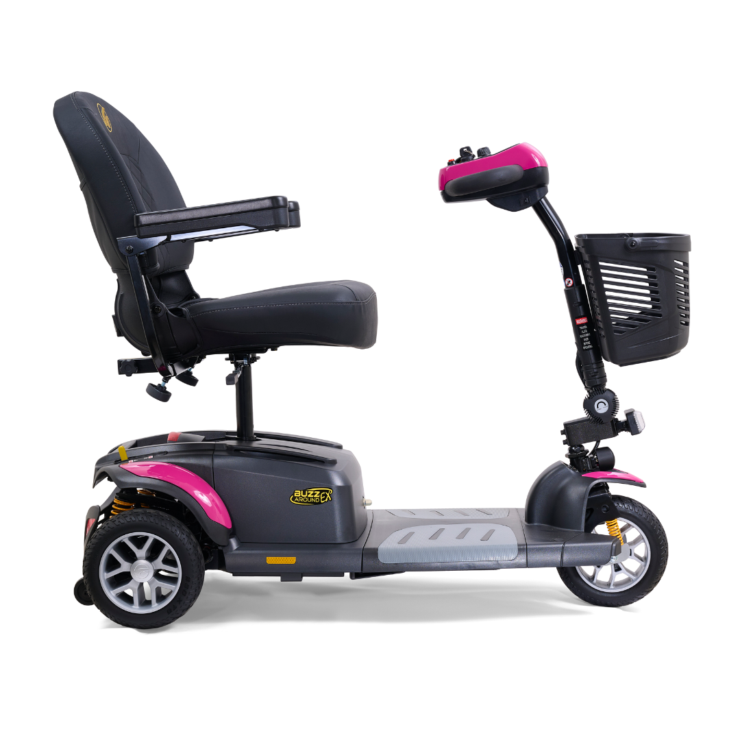 The Golden Tech GB118 Buzzaround EX Portable Mobility Scooter is a lightweight, red and black model featuring three wheels, handlebar controls, a padded seat with armrests, footrest, and basket. Its designed for efficient personal transportation both indoors and outdoors.
