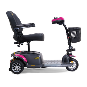The Golden Tech GB118 Buzzaround EX Portable Mobility Scooter is a lightweight, red and black model featuring three wheels, handlebar controls, a padded seat with armrests, footrest, and basket. Its designed for efficient personal transportation both indoors and outdoors.