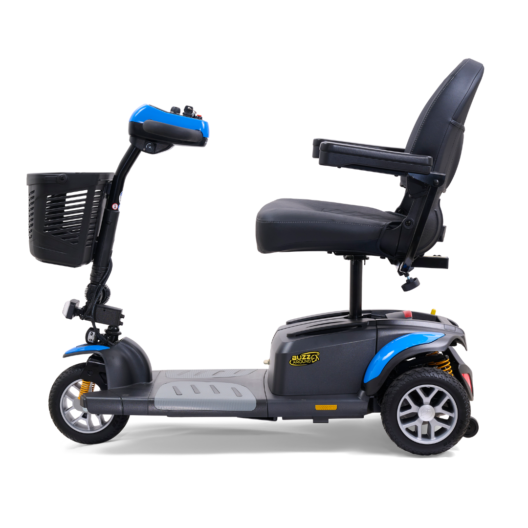 The Golden Tech GB118 Buzzaround EX Scooter, a blue and black three-wheeler, features a comfortable seat, handlebar controls, and a front basket. This lightweight model is crafted for easy transport and excellent maneuverability.