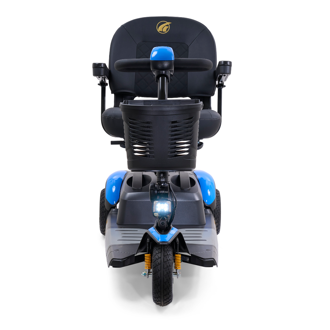 Front view of a blue Golden Tech GB118 Buzzaround EX Portable Mobility Scooter with a black seat and backrest. A basket sits on the handlebars above the headlight below. This three-wheel scooter has a lightweight, modern, and compact design.