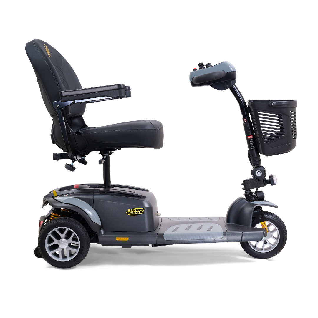 The Golden Tech GB118 Buzzaround EX is a lightweight, black, three-wheeled scooter with a padded seat and armrests. It includes a front basket and an intuitive control panel on the tiller for easy maneuverability and enhanced functionality.