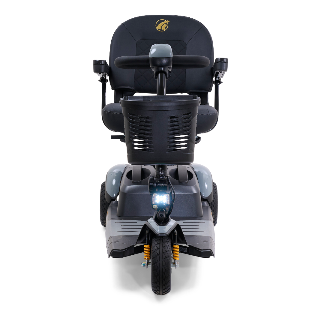 Front view of the Golden Tech GB118 Buzzaround EX Portable Mobility Scooter with a black seat, handlebars, and basket. This full-size scooter has a headlight and agile three-wheel design, featuring a logo on the seat backrest.