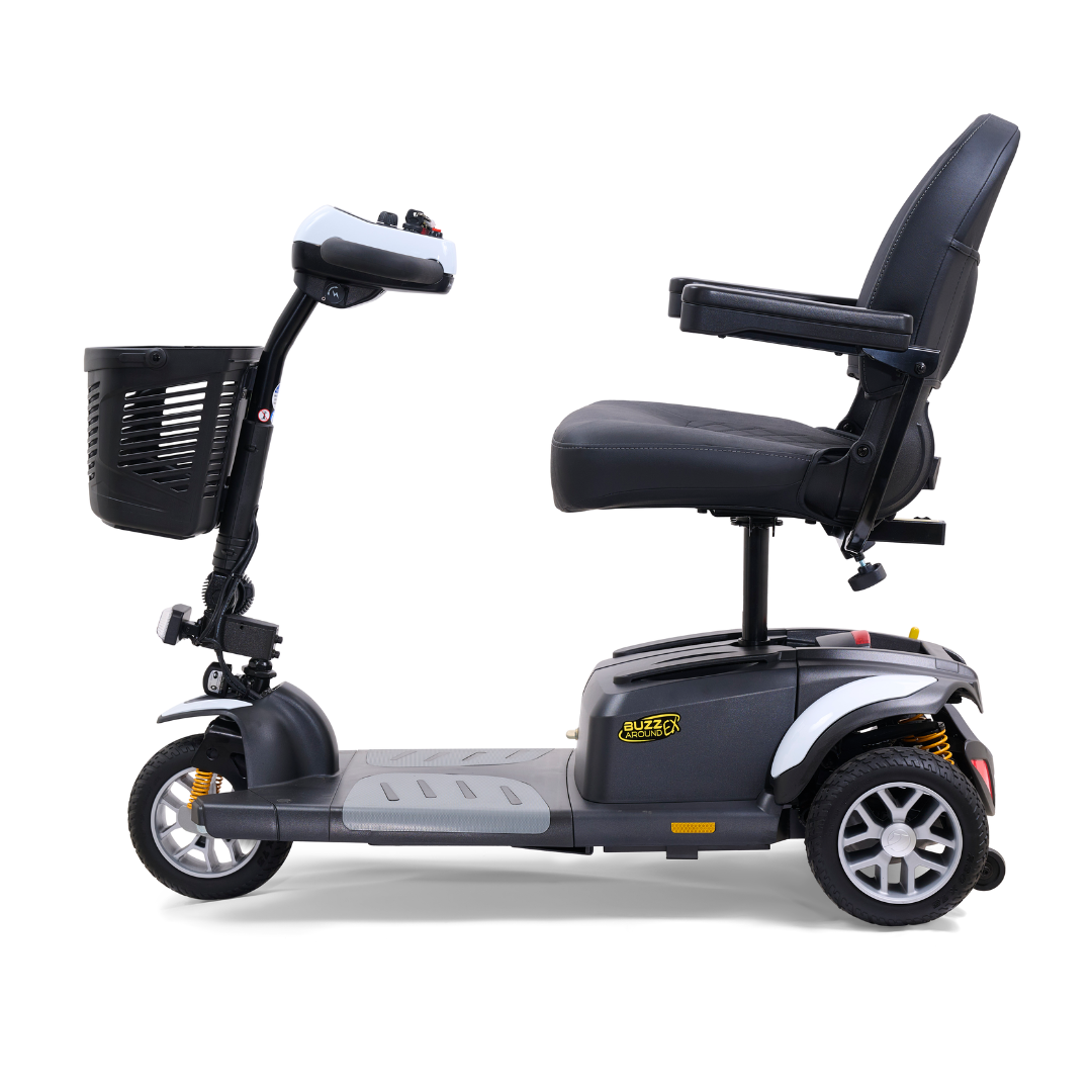 Introducing the Golden Tech GB118 Buzzaround EX Portable Mobility Scooter, showcasing three wheels, a comfortable black seat with armrests, a front basket, and handlebar controls for an exceptional ride, all in a sleek design on a white background.