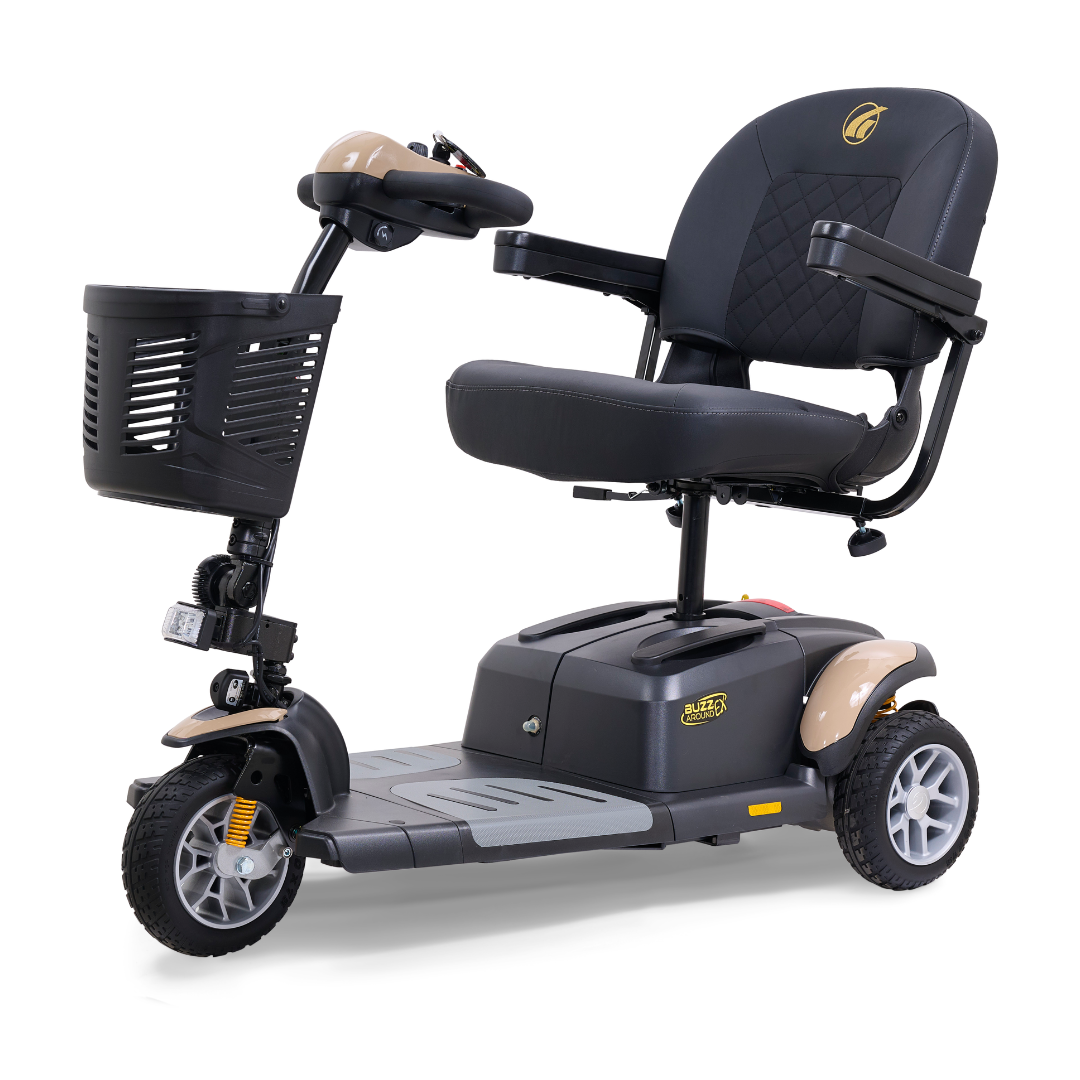 The Golden Tech GB118 Buzzaround EX is a black and gray mobility scooter with a padded seat, armrests, and front basket. This three-wheel full-size scooter features handlebars and front lights for convenient transportation.