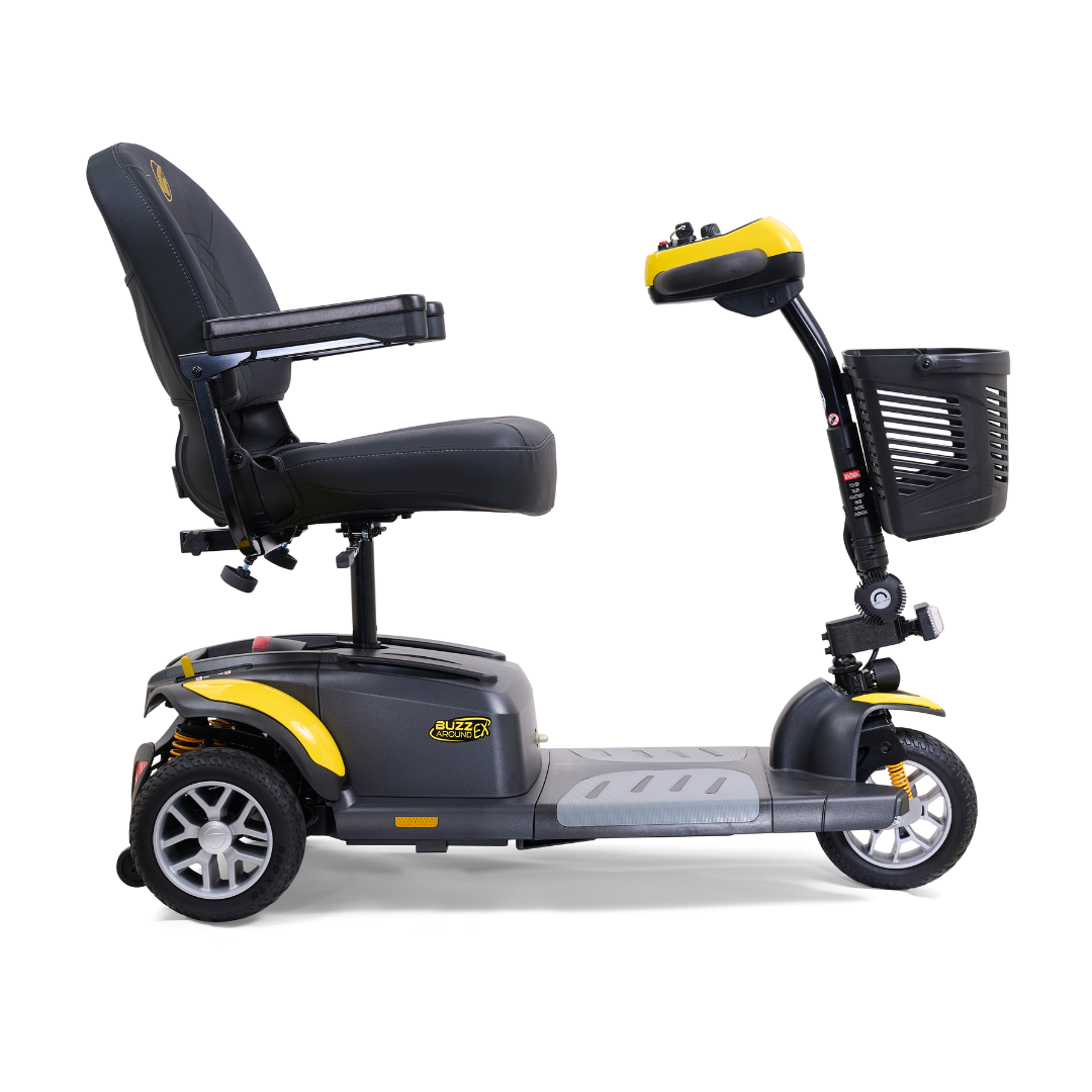 The Golden Tech GB118 Buzzaround EX Portable Mobility Scooter showcases a side view with its black and yellow design. This lightweight 3-wheel scooter includes a comfy seat with armrests and a front basket for stability and convenience.