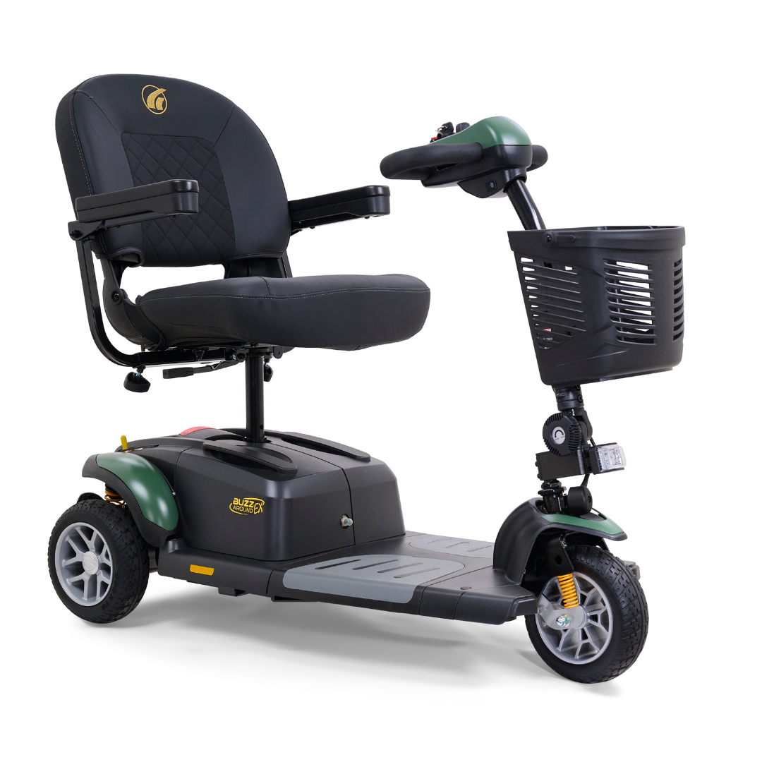 The Golden Tech GB118 Buzzaround EX Portable Mobility Scooter, a black and green three-wheeler, offers a high-backed seat, armrests, a front basket, handlebar control panel, and an access ramp for easy mobility.