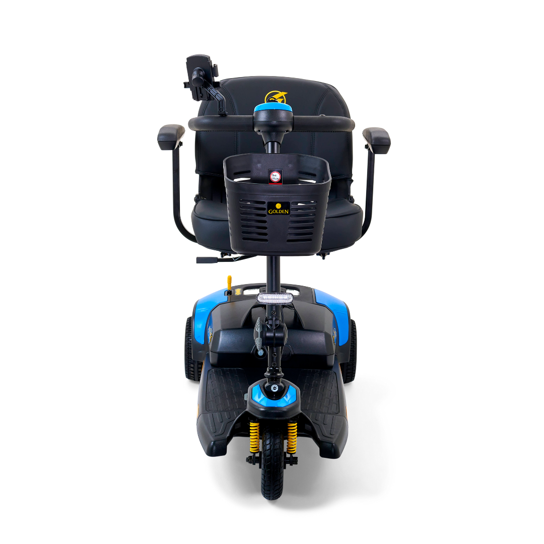 The Golden Tech GB121 Buzzaround XLS HD 3-Wheel Portable Scooter features a front view in blue, with a black seat, armrests, and a small basket on the handlebars. Its golden comfort spring suspension on the front wheel ensures enhanced durability and smoother rides across various terrains.