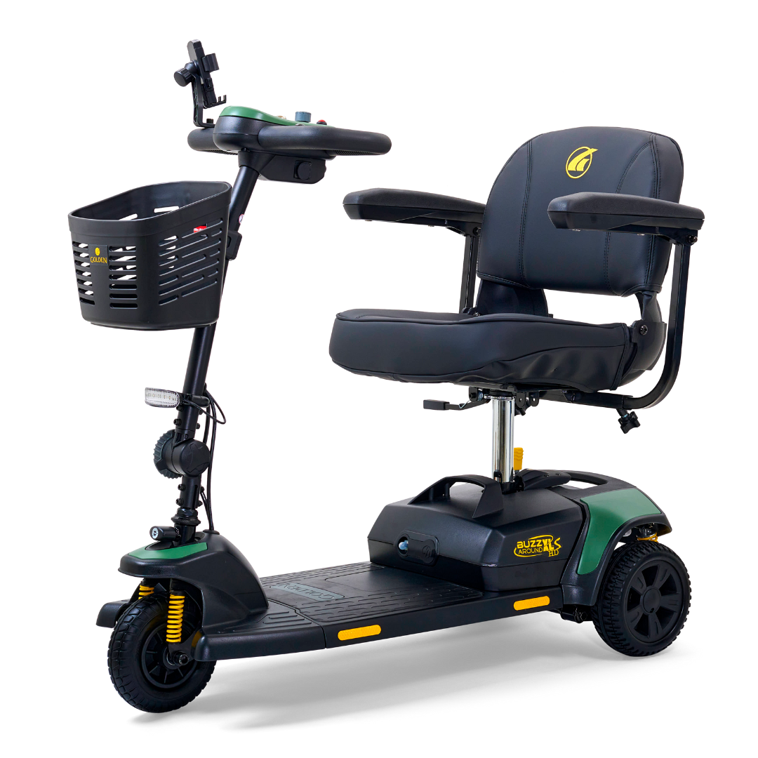 The Golden Tech GB121 Buzzaround XLS HD boasts a compact black and green frame, XR Extended Range Battery, cushioned seat, armrests, handlebar controls, and a front basket. Its three-wheel design ensures stability for efficient mobility.