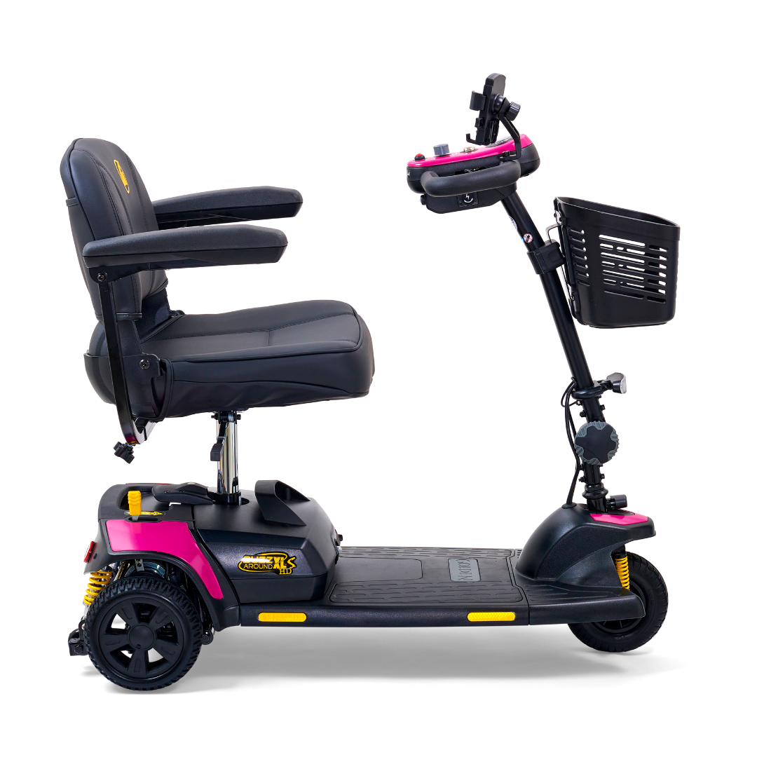 The Golden Tech GB121 Buzzaround XLS HD is a black and pink 3-wheel portable scooter with a stadium-style seat, armrests, small front basket, handlebars, and Comfort Spring Suspension. Compact for personal transport, it supports up to 325 lbs.