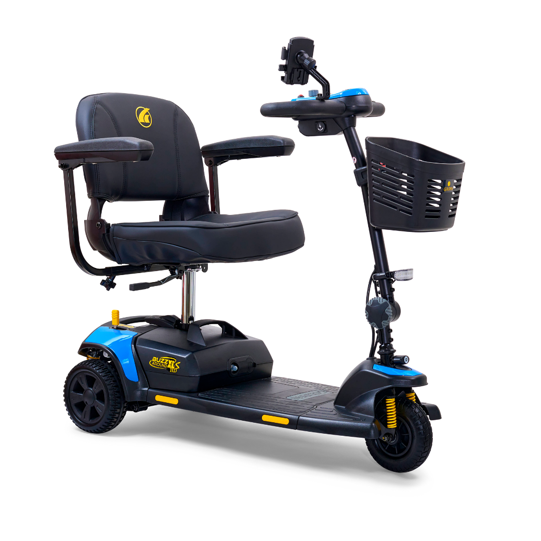 The Golden Tech GB121 Buzzaround XLS HD is a blue three-wheeled portable scooter featuring Comfort Spring Suspension, a black cushioned seat with armrests, control handlebars, and a front basket. Its sleek design enhances personal mobility assistance.