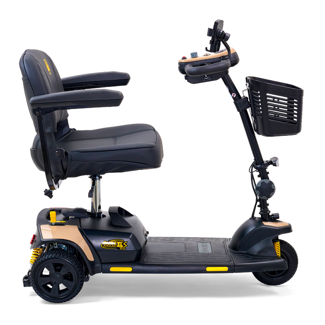 The Golden Tech GB121 Buzzaround XLS HD 3-Wheel Portable Scooter offers a cushioned seat, armrests, a front basket, and a Delta tiller with grips. Its sleek black and gold design includes Comfort Spring Suspension for smooth extended journeys.