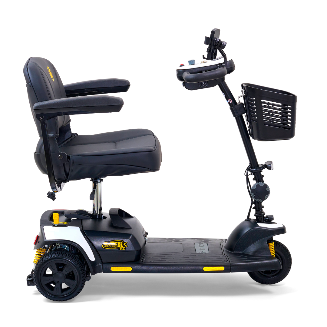 The Golden Tech GB121 Buzzaround XLS HD is a black 3-wheel portable scooter featuring a delta tiller, cushioned stadium-style seat with armrests, handlebar control panel, small front basket, bright yellow accents, and Comfort Spring Suspension for a smooth ride.