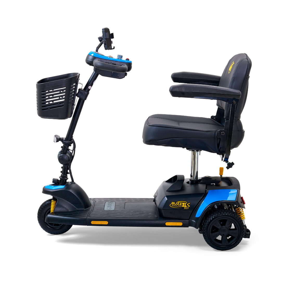 Side view of the Golden Tech GB121 Buzzaround XLS HD 3-Wheel Portable Scooter. It has a black and blue design, basket, adjustable seat with armrests, handlebars for steering, Comfort Spring Suspension for durability, and an extended range battery for longer journeys.