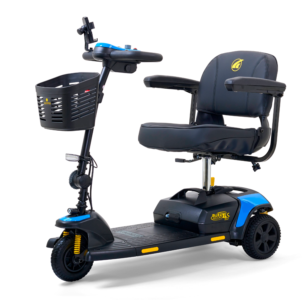 The Golden Tech GB121 Buzzaround XLS HD is a blue and black 3-wheel mobility scooter featuring a cushioned seat, basket, delta tiller handlebars, sturdy base, small lights, and Comfort Spring Suspension for improved maneuverability and comfort.
