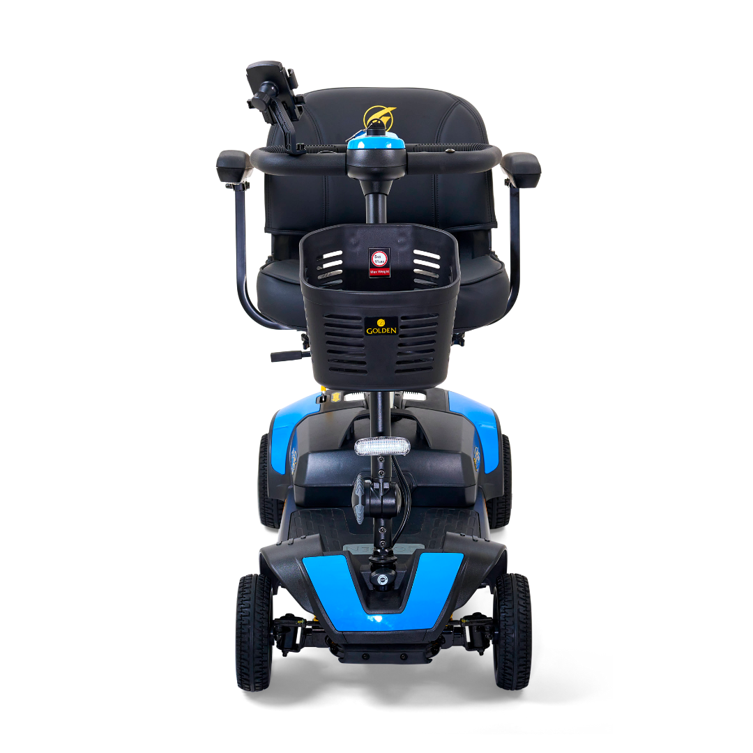 The Golden Tech GB124 Buzzaround XLS HD is a blue and black 4-wheel portable scooter with a padded seat and Delta tiller handlebars. It features Comfort Spring Suspension for smooth rides, ensuring accessibility and ease of movement. The brand name is visible on the front panel.