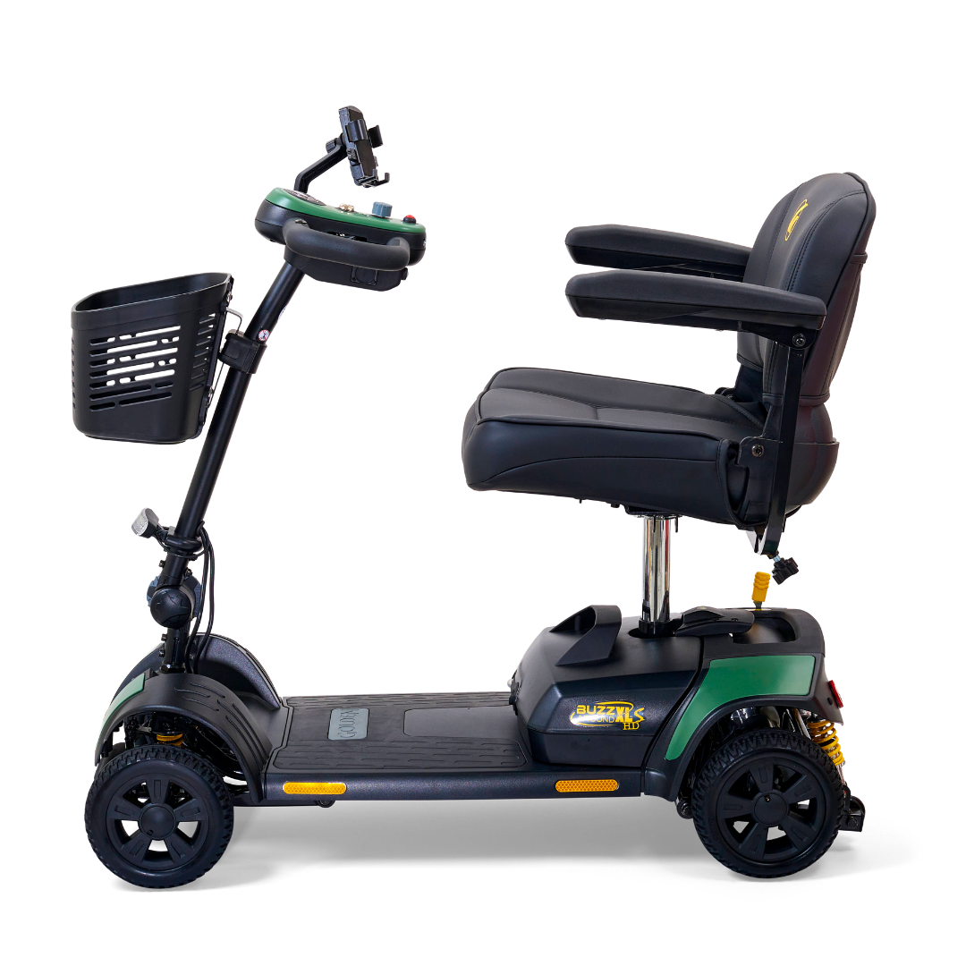 Side view of the Golden Tech GB124 Buzzaround XLS HD 4-Wheel Portable Scooter, featuring an XR Extended Range Battery and Delta tiller. With cushioned seats, armrests, and a basket on the handlebars, this black and green model ensures stability and comfort on any journey.