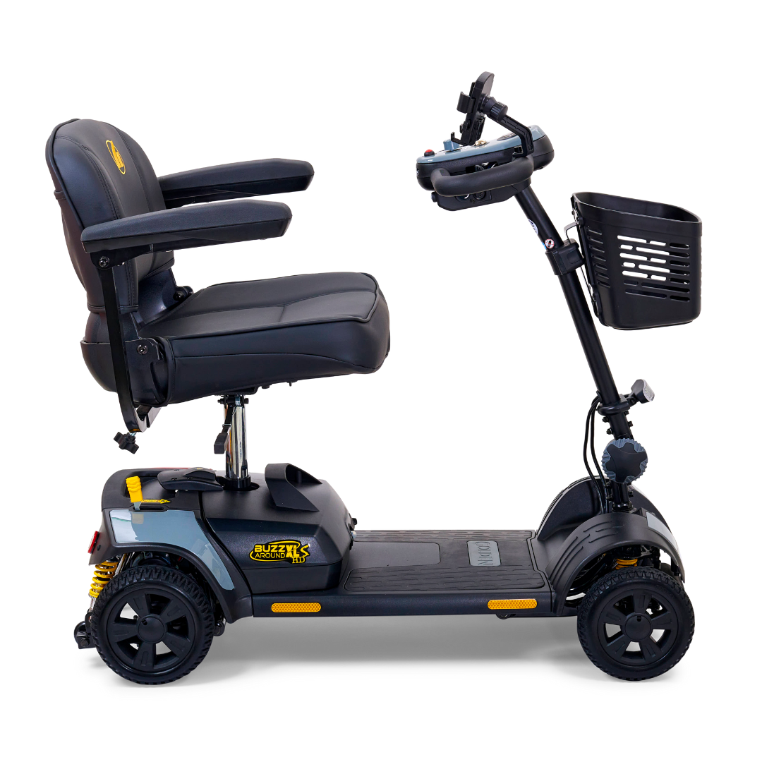 The Golden Tech GB124 Buzzaround XLS HD is a 4-wheel portable scooter with suspension, featuring a black cushioned seat, armrests, backrest, delta tiller handlebar with controls, front basket, and an XR Extended Range Battery for optimal personal mobility assistance.