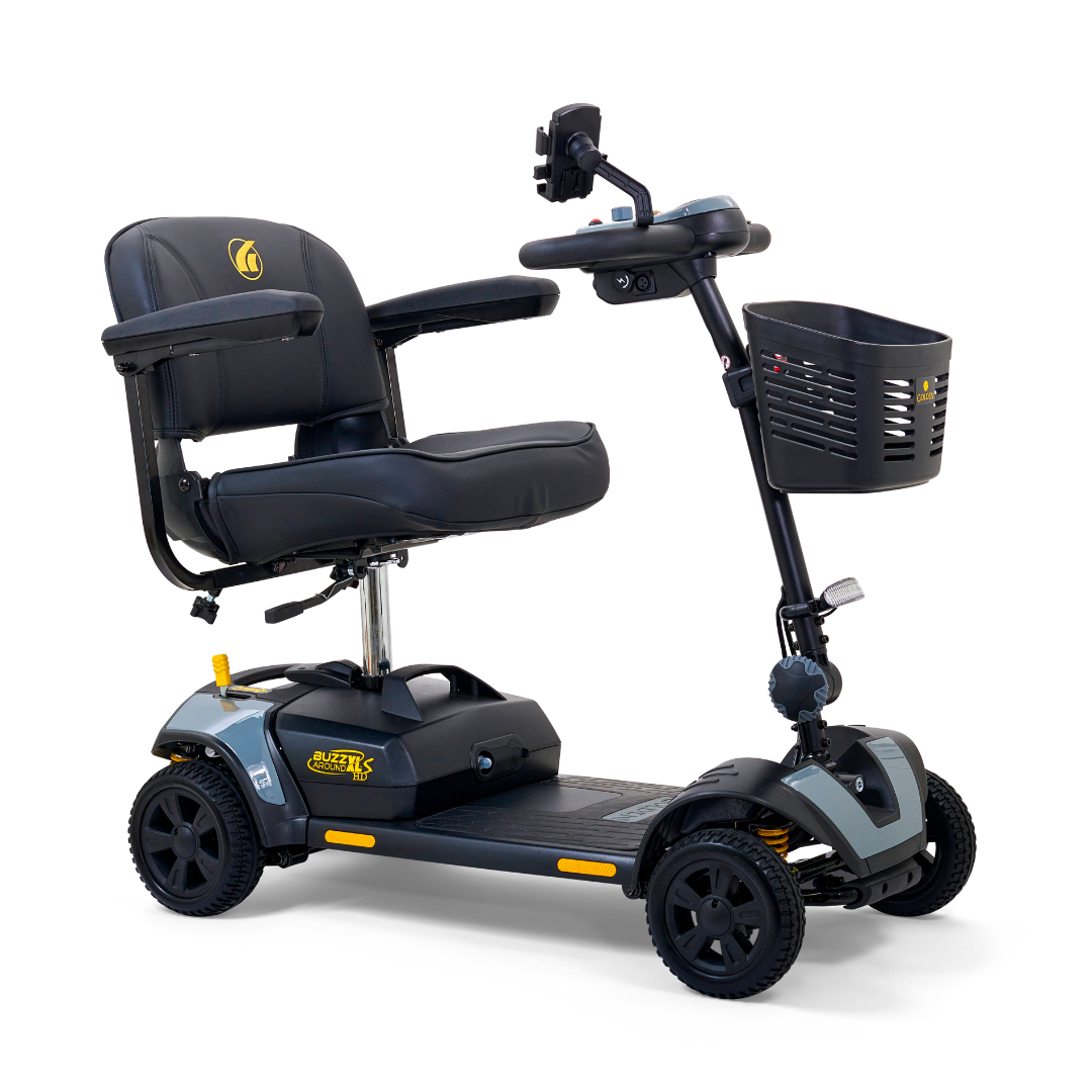 The Golden Tech GB124 Buzzaround XLS HD 4-Wheel Portable Scooter in black and gray features a padded seat, armrests, front basket, Comfort Spring Suspension, and a delta tiller for easy control. Ideal for accessibility and long journeys with its XR Extended Range Battery.