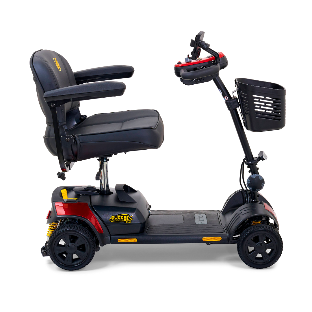 The Golden Tech GB124 Buzzaround XLS HD is a black and red 4-wheel scooter featuring a cushioned seat, armrests, Delta tiller handlebar, an XR Extended Range Battery for longer rides, a small front basket, suspension system, and stylish yellow accents.