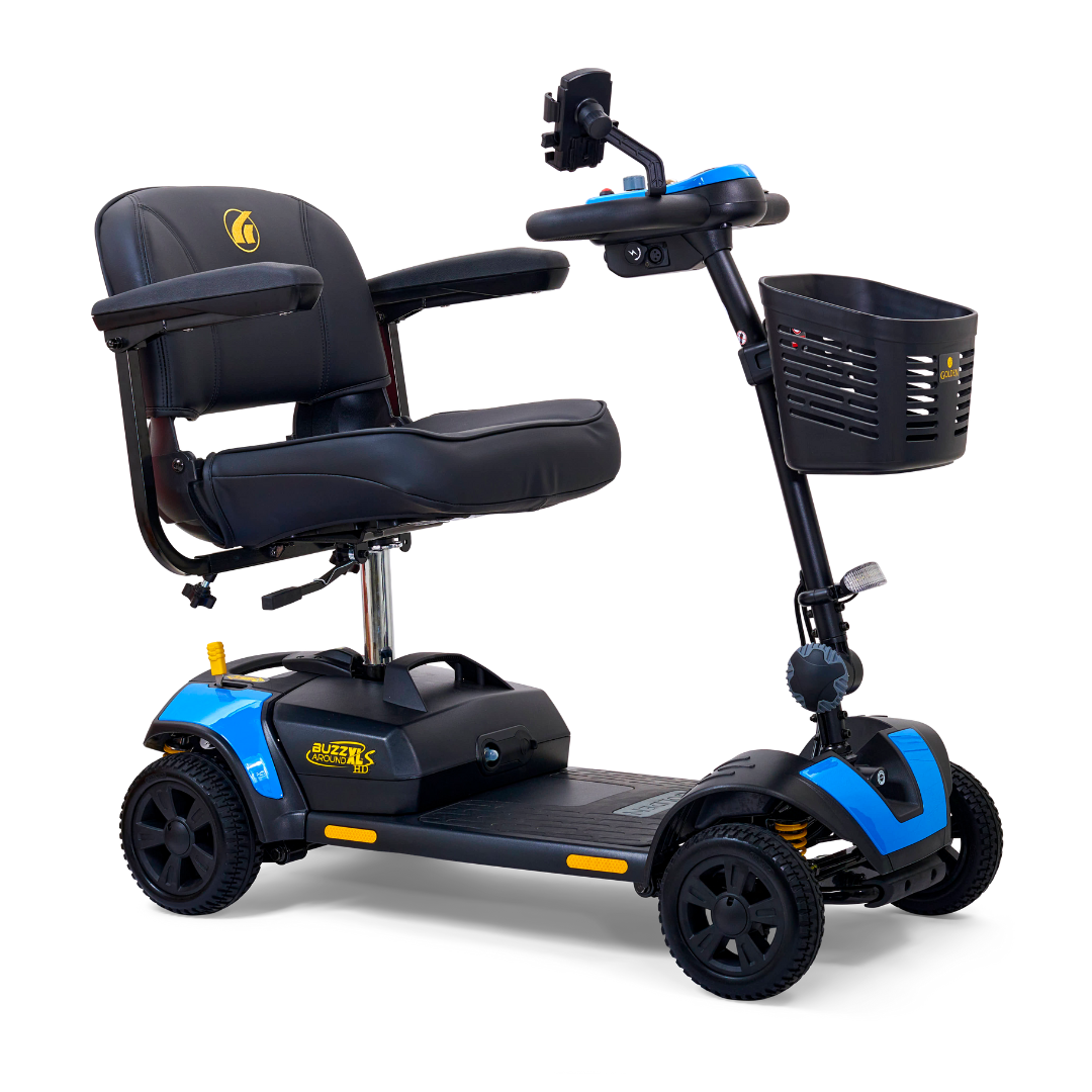 The Golden Tech GB124 Buzzaround XLS HD is a blue and black electric mobility scooter with four wheels, a cushioned seat with armrests, Delta tiller control panel, front basket, elevated seating for smooth rides through Comfort Spring Suspension, and handlebars with a phone holder attachment.