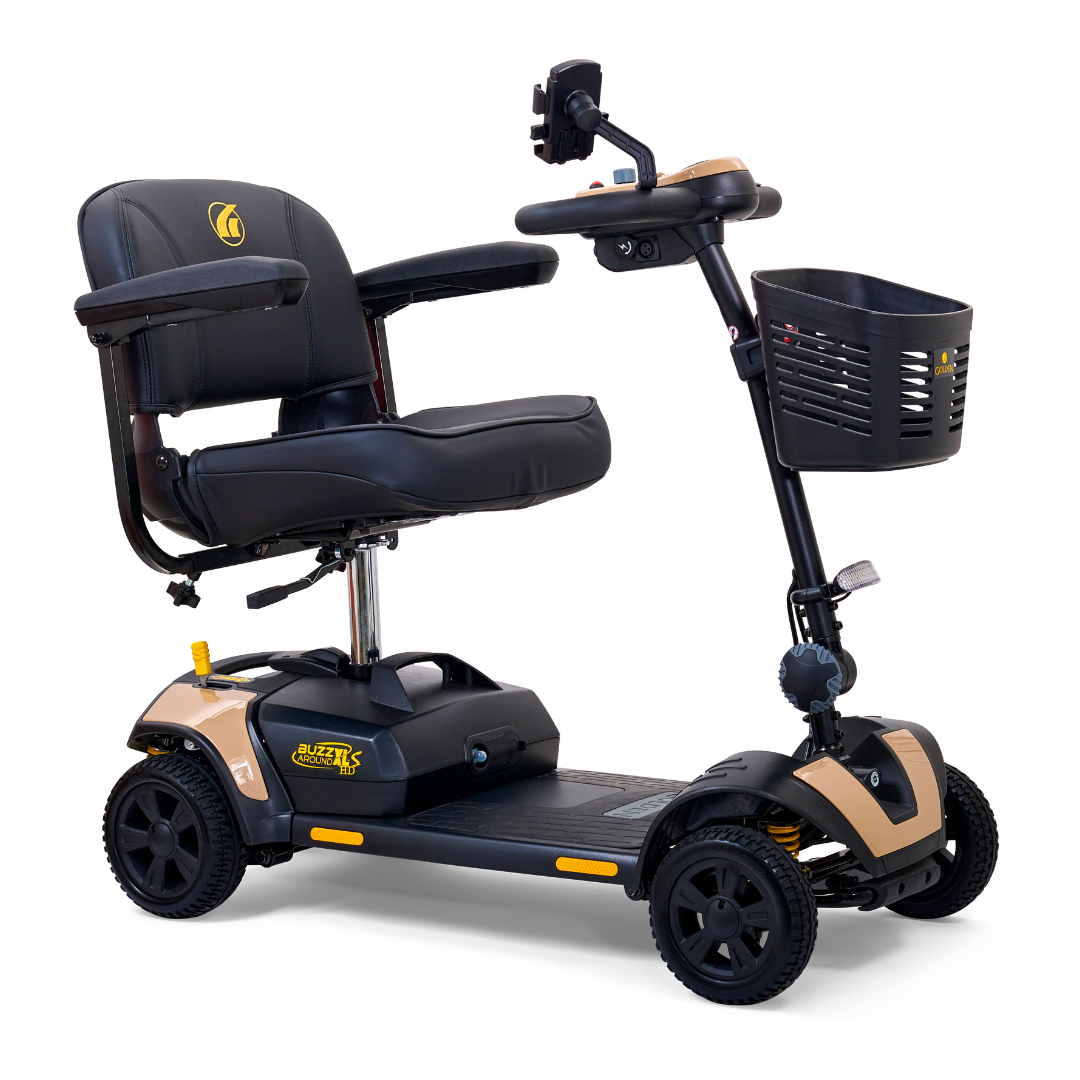The Golden Tech GB124 Buzzaround XLS HD features a sleek black and gold design, Comfort Spring Suspension, a padded seat with armrests, a control panel with handlebars, a front basket, and four wheels for exceptional stability.