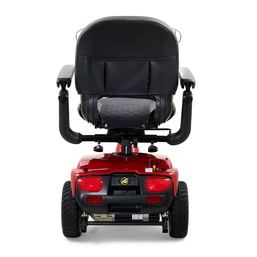 The Golden Tech GC340 Companion Scooter, seen from the back, features a red design with four wheels, a black cushioned high-back stadium-style seat, and armrests. Its adjustable tiller and sturdy base ensure comfortable transport.