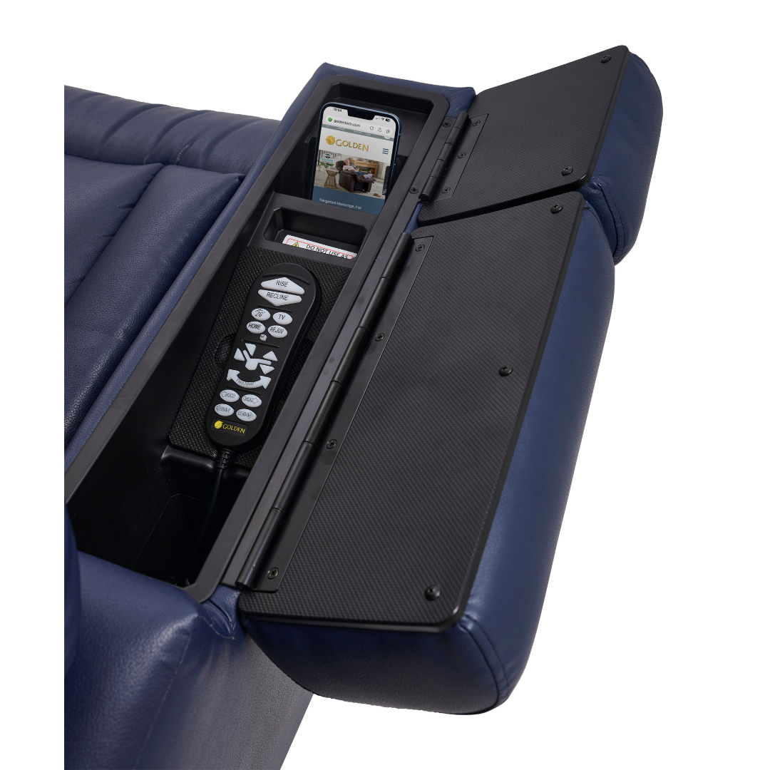 A close-up of the Golden Tech PR525 Cloud+ Recliner With Lift Assist & Twilight - SMâs blue memory foam armrest shows its open storage compartment with a black hinged lid, holding a remote control and smartphone inside.