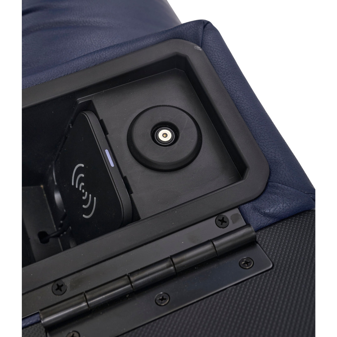 Close-up of a built-in wireless charging pad and circular power port inside the compartment of a Golden Tech PR525 Cloud+ Recliner With Lift Assist & Twilight - SM, possibly in the blue upholstered armrest.