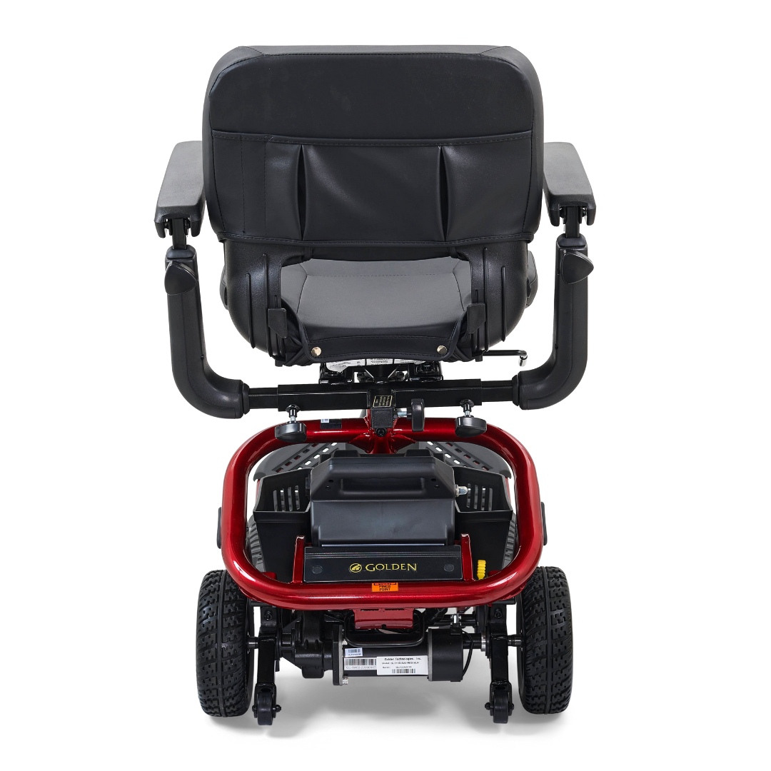 A red and black Golden Tech GL111 LiteRider 3-Wheel Mobility Scooter is shown from the back, featuring a cushioned seat with armrests. The Golden brand name is visible on the base, highlighting its sleek and comfortable ride.