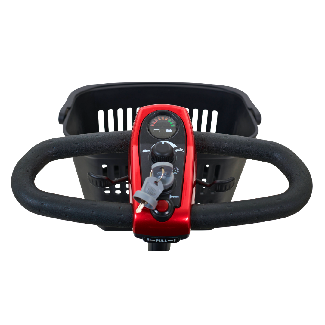 Close-up of a Golden Tech GL111 LiteRider 3-Wheel Mobility Scooter handlebar showing a black textured grip and red control panel with a key in the ignition. A front basket and the Delta Tiller design, featuring a visible dial indicator for easy access and control, are also shown.