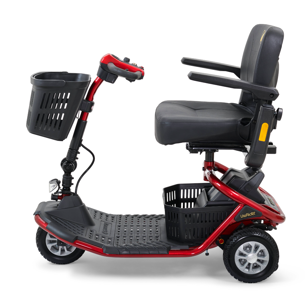 The Golden Tech GL111 LiteRider 3-Wheel Mobility Scooter showcases a sleek red design with a black seat, armrests, and front basket. Featuring a Delta Tiller and black floorboard for comfort and style, it also includes a back basket for added functionality, elegantly displayed from the side view.