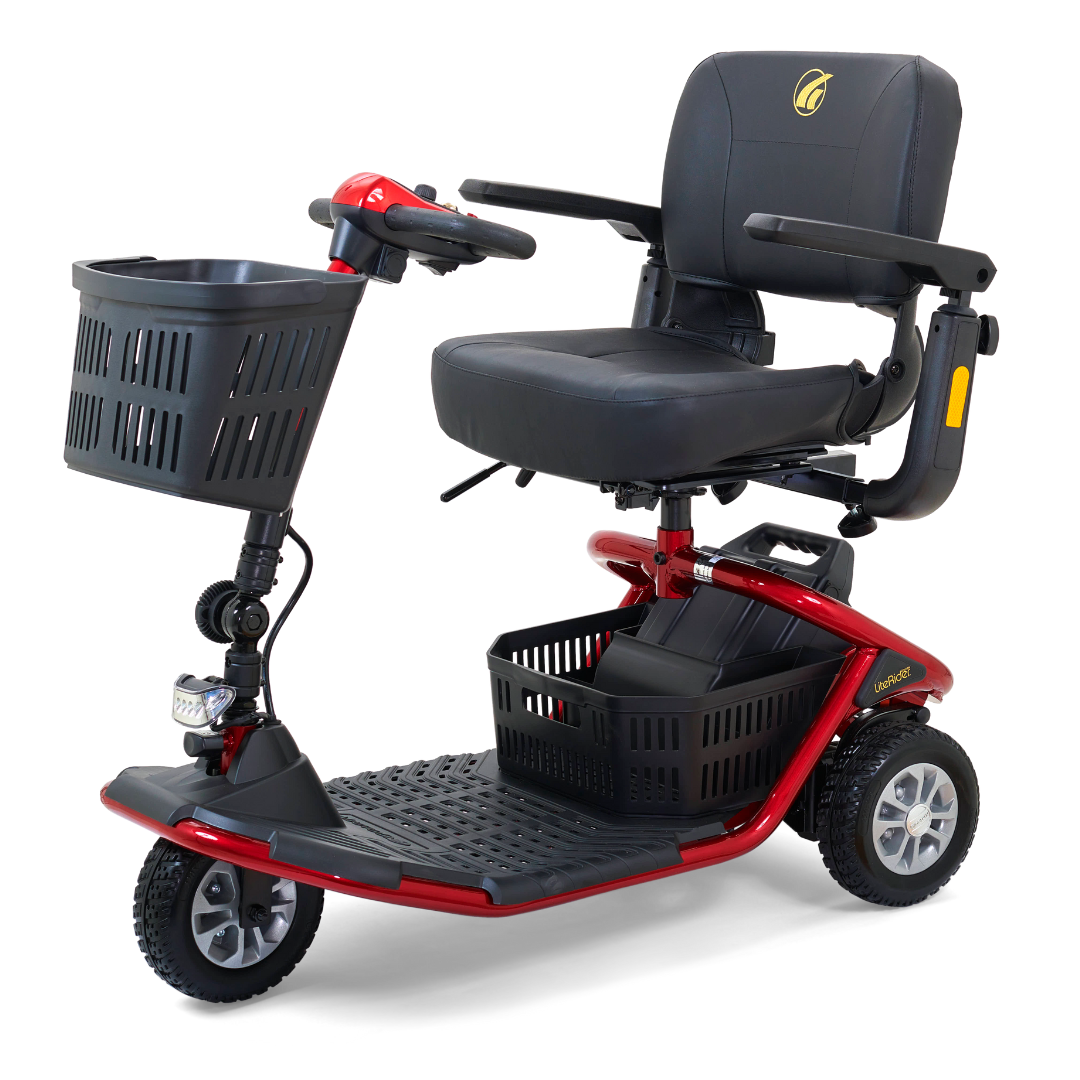 The Golden Tech GL111 LiteRider 3-Wheel Mobility Scooter comes in red and includes a Delta Tiller, black cushioned seat, front basket, handlebars, headlight, and footrests. It offers easy wireless disassembly for accessible personal transport.