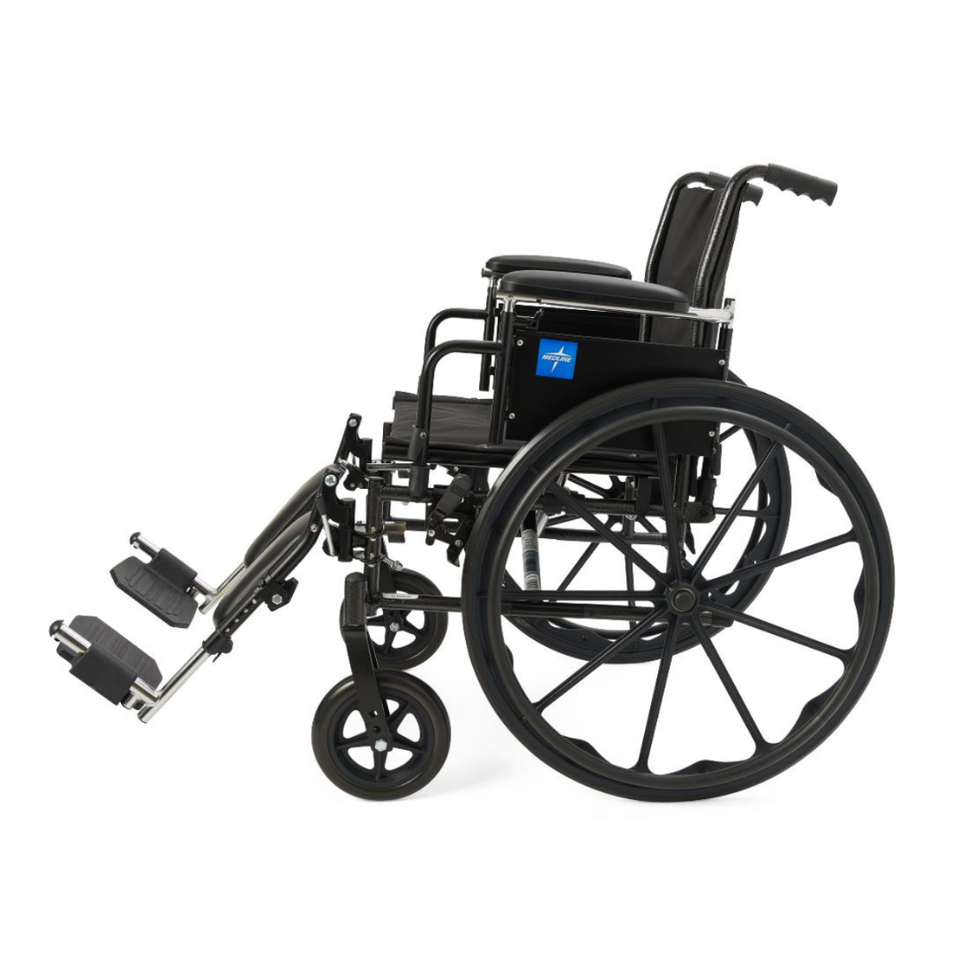 The Medline Lightweight K3 Wheelchair, shown from the side on a white background, is a manual model with large rear wheels, small front casters, footrests, armrests, a lightweight frame, and nylon upholstery.