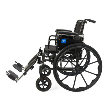 The Medline Lightweight K3 Wheelchair, shown from the side on a white background, is a manual model with large rear wheels, small front casters, footrests, armrests, a lightweight frame, and nylon upholstery.