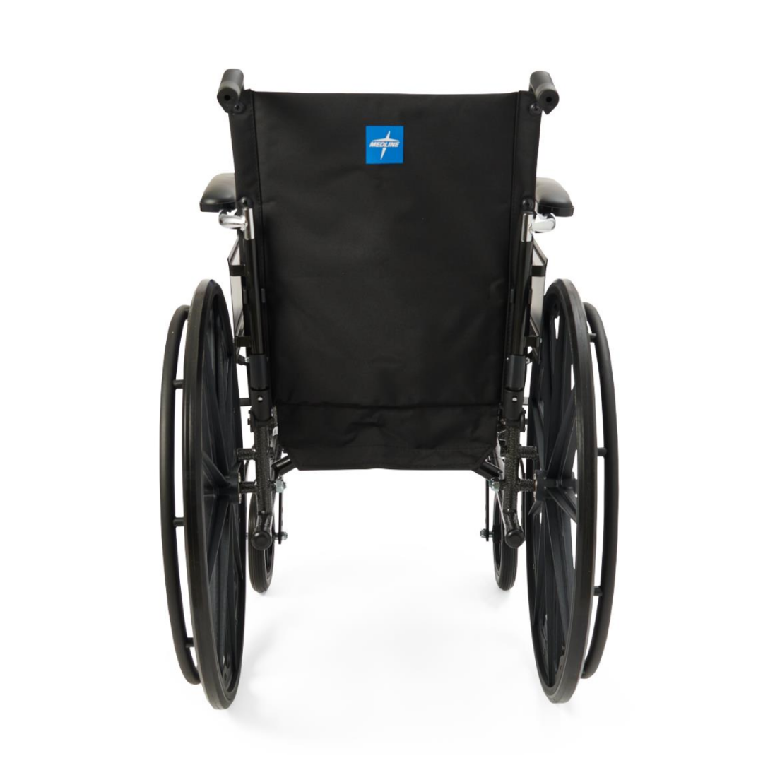 The Medline Lightweight K3 Wheelchair in black is shown from the back, highlighting its large rear wheels, push handles, lightweight frame, fabric backrest with nylon upholstery, and blue and white logo.