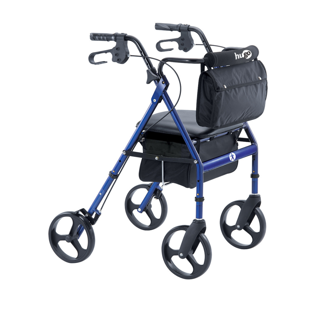 A Drive Hugo Elite Rolling Walker with a seat, blue finish, four wheels, hand brakes, a padded seat, a black storage bag under the seat, and an extra black bag attached to the handlebar.