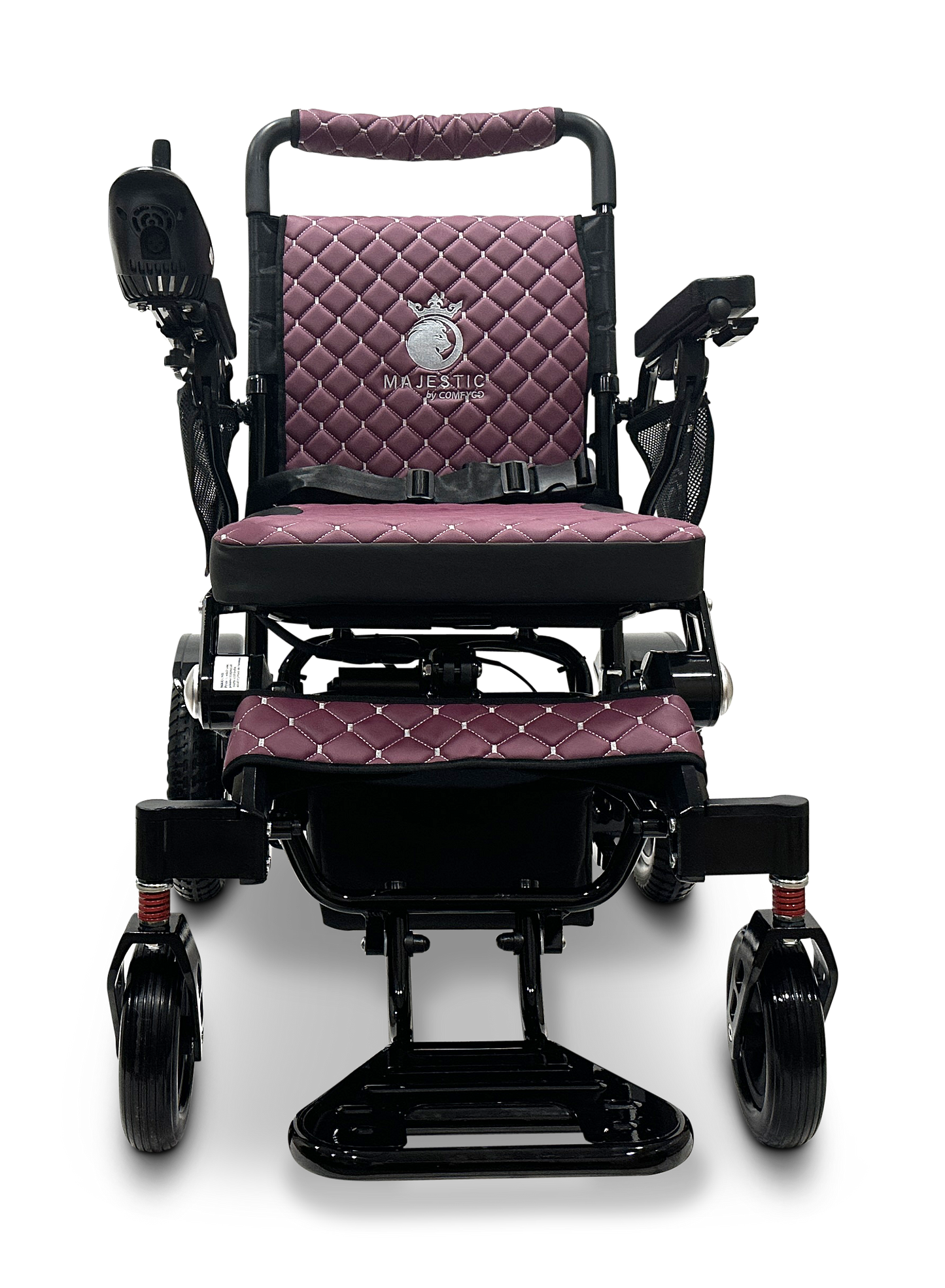 A front view of the MAJESTIC IQ-7000 Remote Controlled Electric Wheelchair showcases its sleek, black folding design with quilted maroon cushioning. The backrest displays an emblem reading "Majestic." It is equipped with an intelligent joystick on the left armrest and large front wheels for enhanced stability.