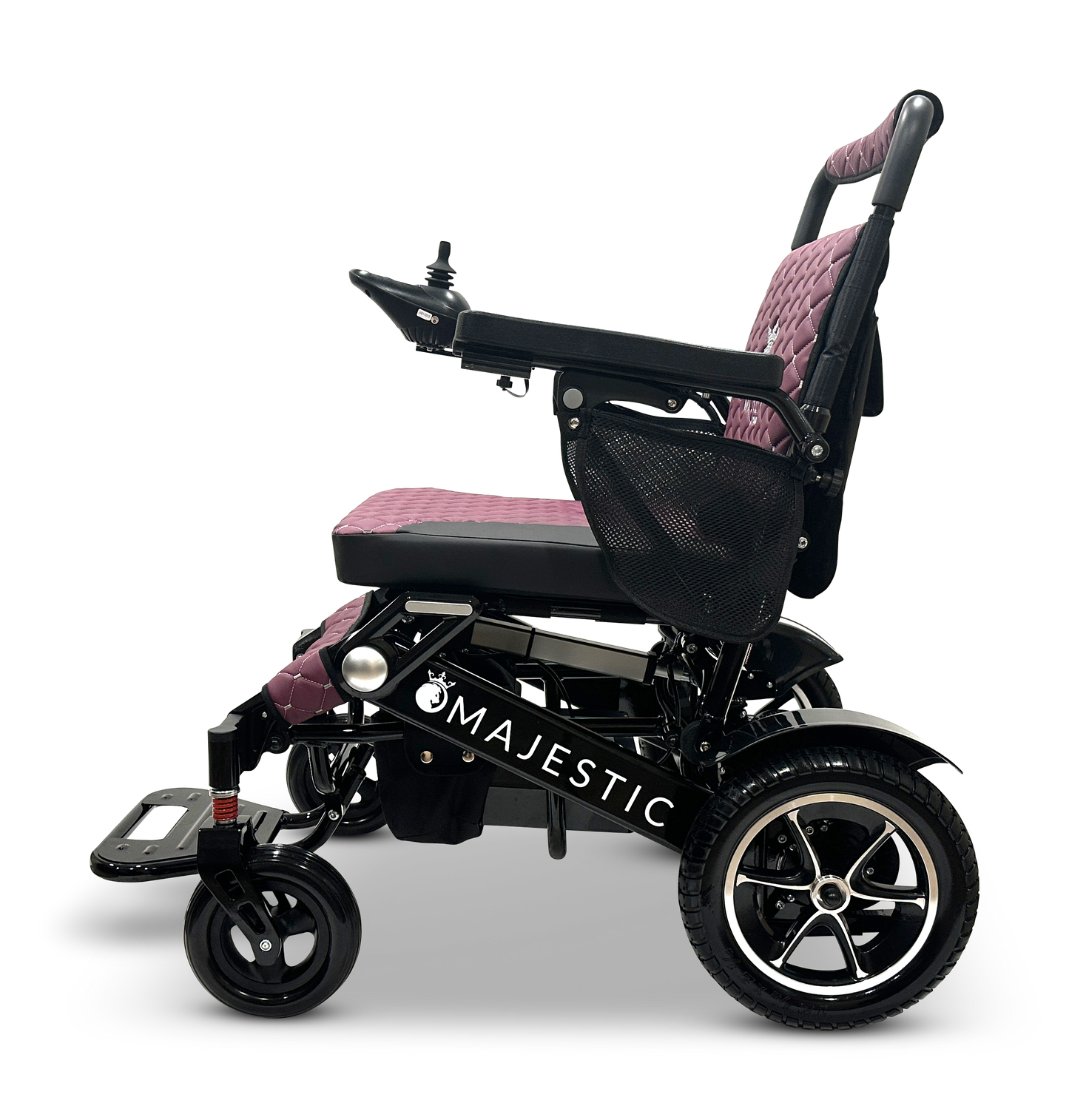 Introducing the MAJESTIC IQ-7000: a sleek black, lightweight electric wheelchair featuring a quilted pink seat and backrest. It is equipped with an intelligent joystick control on the right armrest, a black mesh side pocket, and durable wheels. The name "Majestic" is elegantly printed on the side.