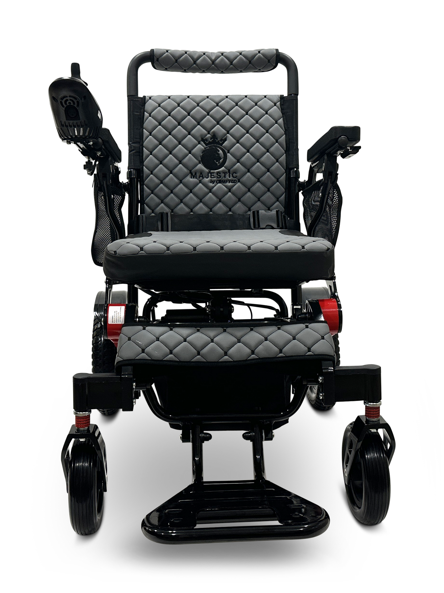 The MAJESTIC IQ-7000 Remote Controlled Electric Wheelchair is a sleek black model with an auto-folding feature and a quilted seat and backrest. It includes comfortable armrests, intelligent joystick control on the right side, and smaller front wheels. The brand logo is prominently displayed on the backrest.