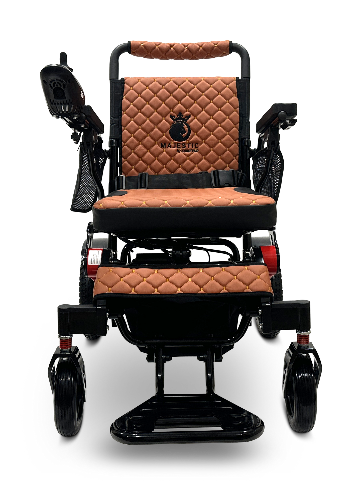 The MAJESTIC IQ-7000 Remote Controlled Electric Wheelchair boasts a lightweight design, featuring a quilted brown leather seat and backrest. It is equipped with joystick control on the left armrest and a sleek black metal frame that allows it to glide effortlessly on four wheels. The distinguished design is enhanced by the elegantly embroidered MAJESTIC logo.