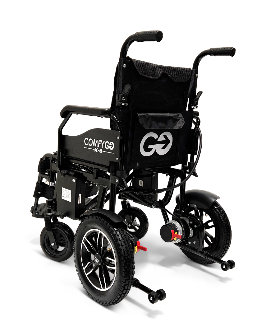 The ComfyGo X-6 Lightweight Electric Wheelchair features a black design with large rear wheels, a 360-degree joystick, handlebars, cushioned seat, small front wheels, and footrests. It combines motorized components with a sleek appearance for exceptional mobility.