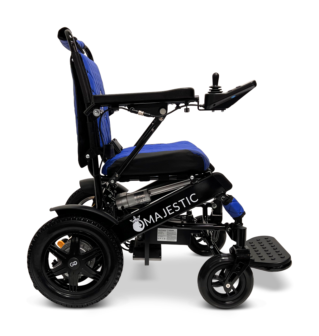 Side view of the ComfyGo MAJESTIC IQ-9000 Auto Reclining Electric Wheelchair in blue and black, with a digital joystick on the right armrest, large rear wheels, a footrest, and an aircraft-grade aluminum alloy frame.