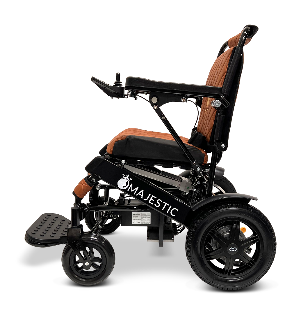 The ComfyGo MAJESTIC IQ-9000 Auto Reclining Electric Wheelchair features a brown and black cushioned seat and backrest, side Majestic label, and powerful brushless silent motors, shown in a side view on a white background.