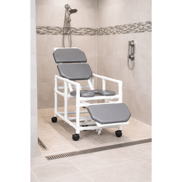 The IPU Reclining Shower Chair – Adjustable Recline & Padded Seating offers safe, cushioned support in a tiled walk-in shower featuring a handheld showerhead and PVC frame.