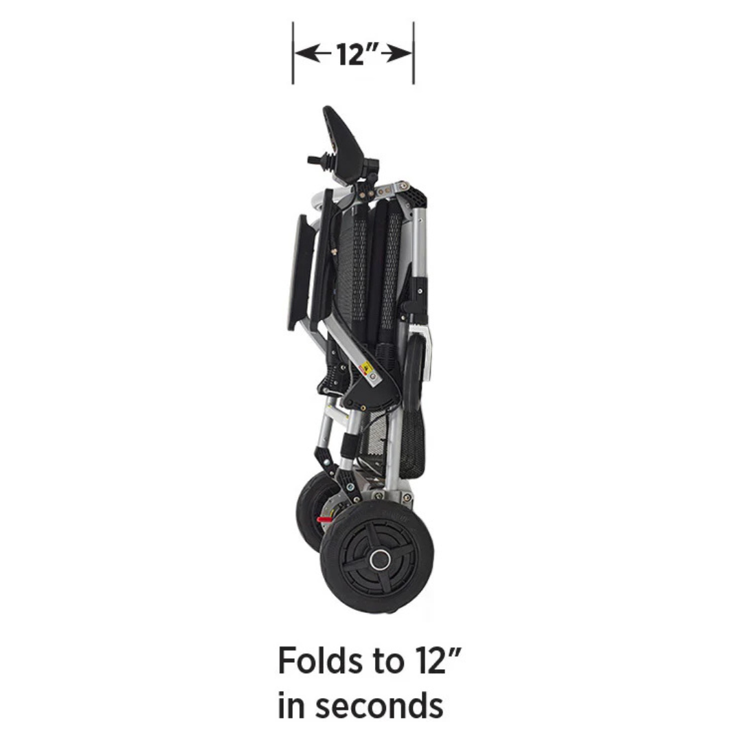 The Journey Zoomer® Portable Travel Powerchair is a compact, folding chair with black and silver components, shown vertically. It folds to 12 inches in seconds, and the two small wheels highlight its portable mobility. FAA approved for travel convenience.