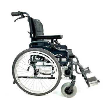 The Karman KM-8520X Bariatric Wheelchair – Lightweight Heavy Duty, shown from the side on a white background, features a black frame with large rear wheels, small front wheels, footrests, and armrests.