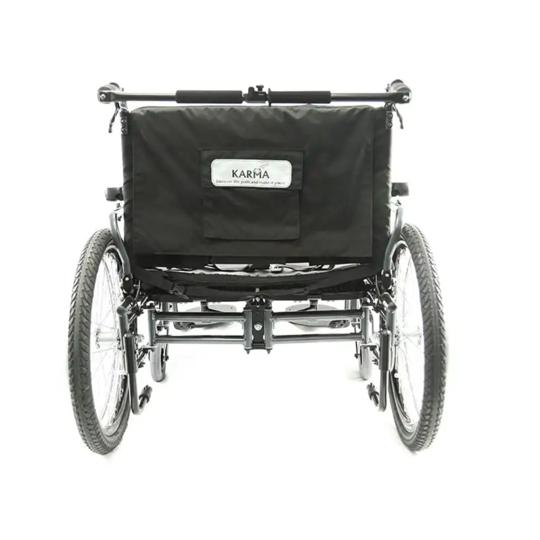 The Karman KM-BT10 Extra Wide Wheelchair with All-Terrain Rear Wheels is shown from the back, featuring large rear wheels, smaller front wheels, and a fabric backrest with a KARMA label against a white background.