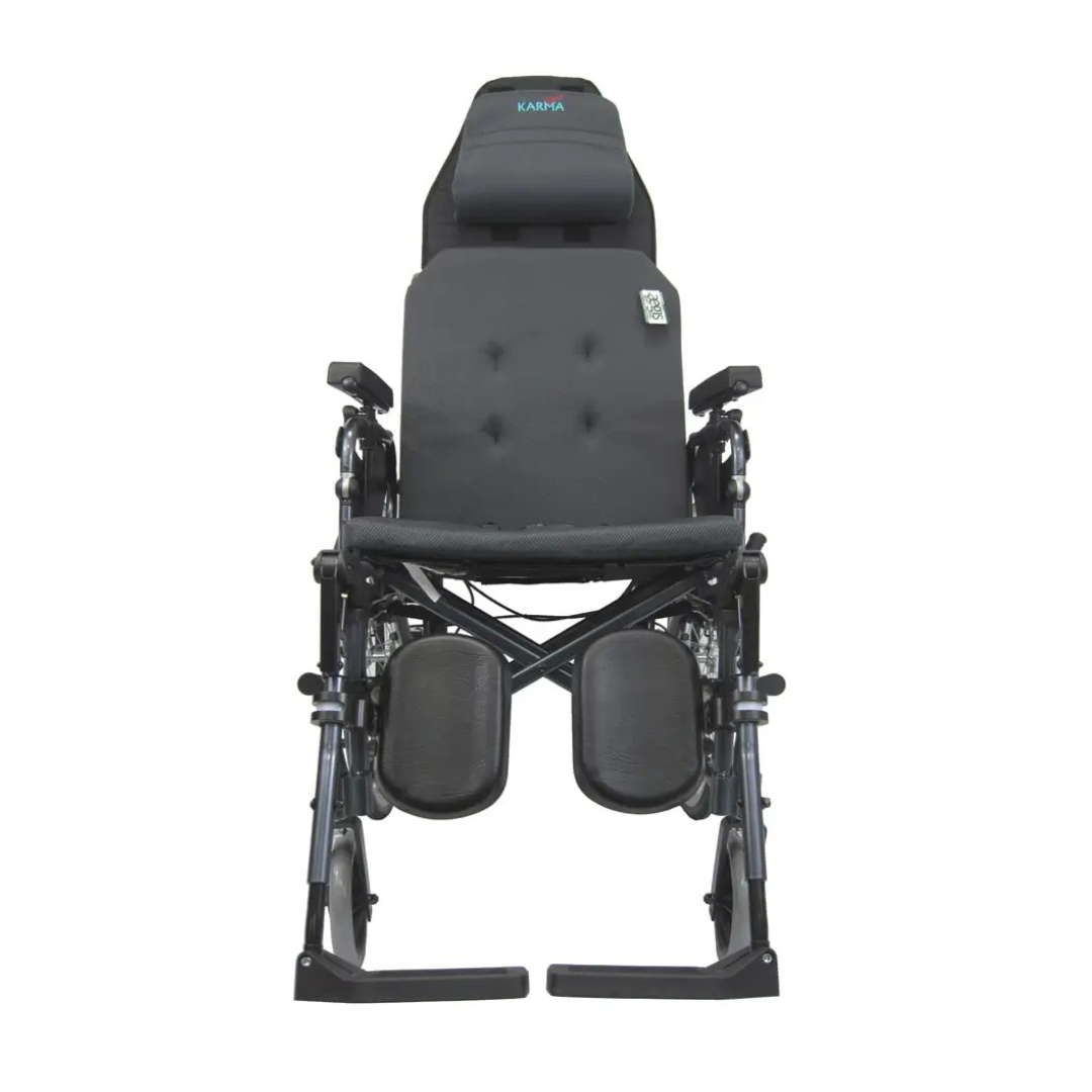 The Karman Aluminum Ultra Lightweight MVP-502 Reclining Wheelchair, shown from the front on a white background, features a black padded seat, ergonomic leg supports, and headrest.
