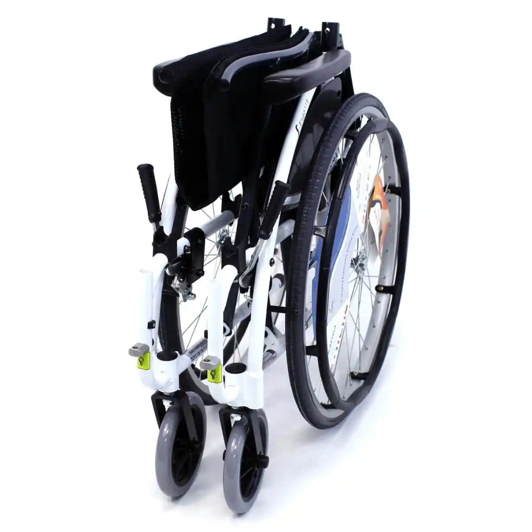 The Karman S-Ergo 115 Ultra Lightweight Ergonomic Wheelchair (25 lbs) is shown folded, featuring a black seat and backrest, white frame, gray wheels, ergonomic seating, a small front wheel, and a larger rear wheel with handrails on a white surface.
